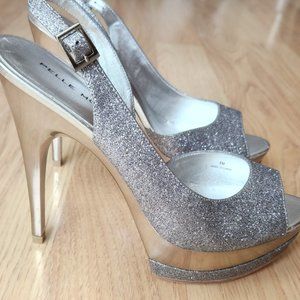 Platform heels Pelle Moda. Sparkling silver